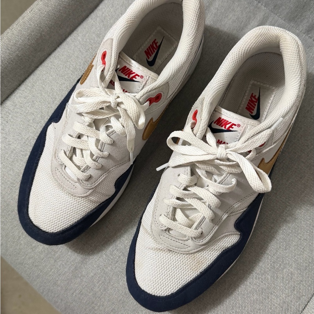 Nike Men's White and Navy Sneakers with Gold Accents